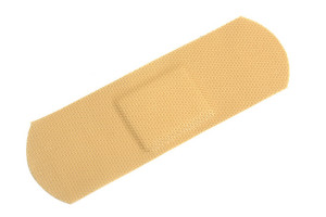 Close up shot of a bandaid against isolated white background.